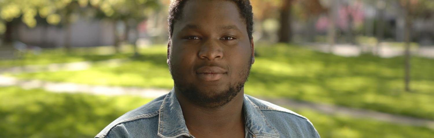 Jaquon sitting in park