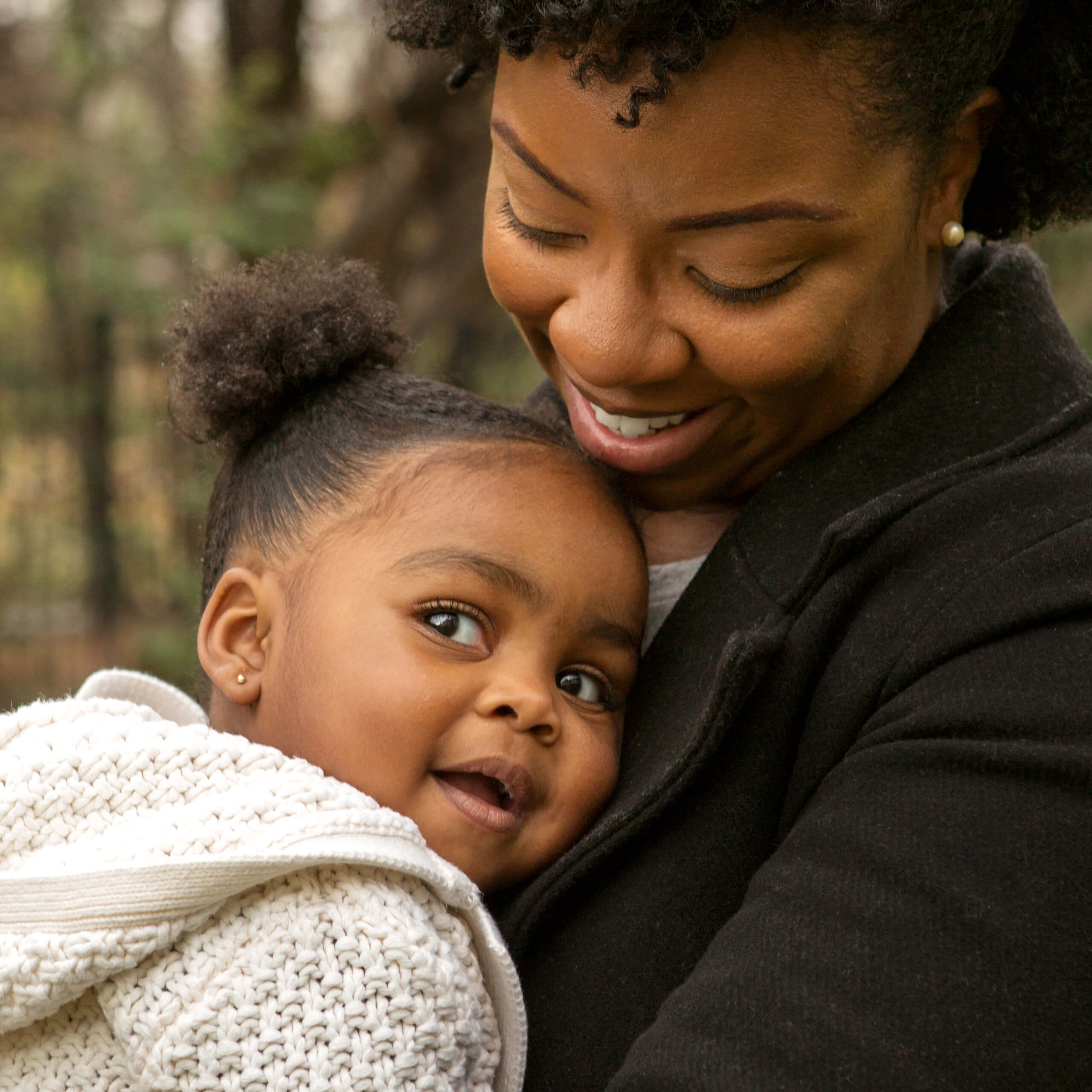 African American mother and her daugher.