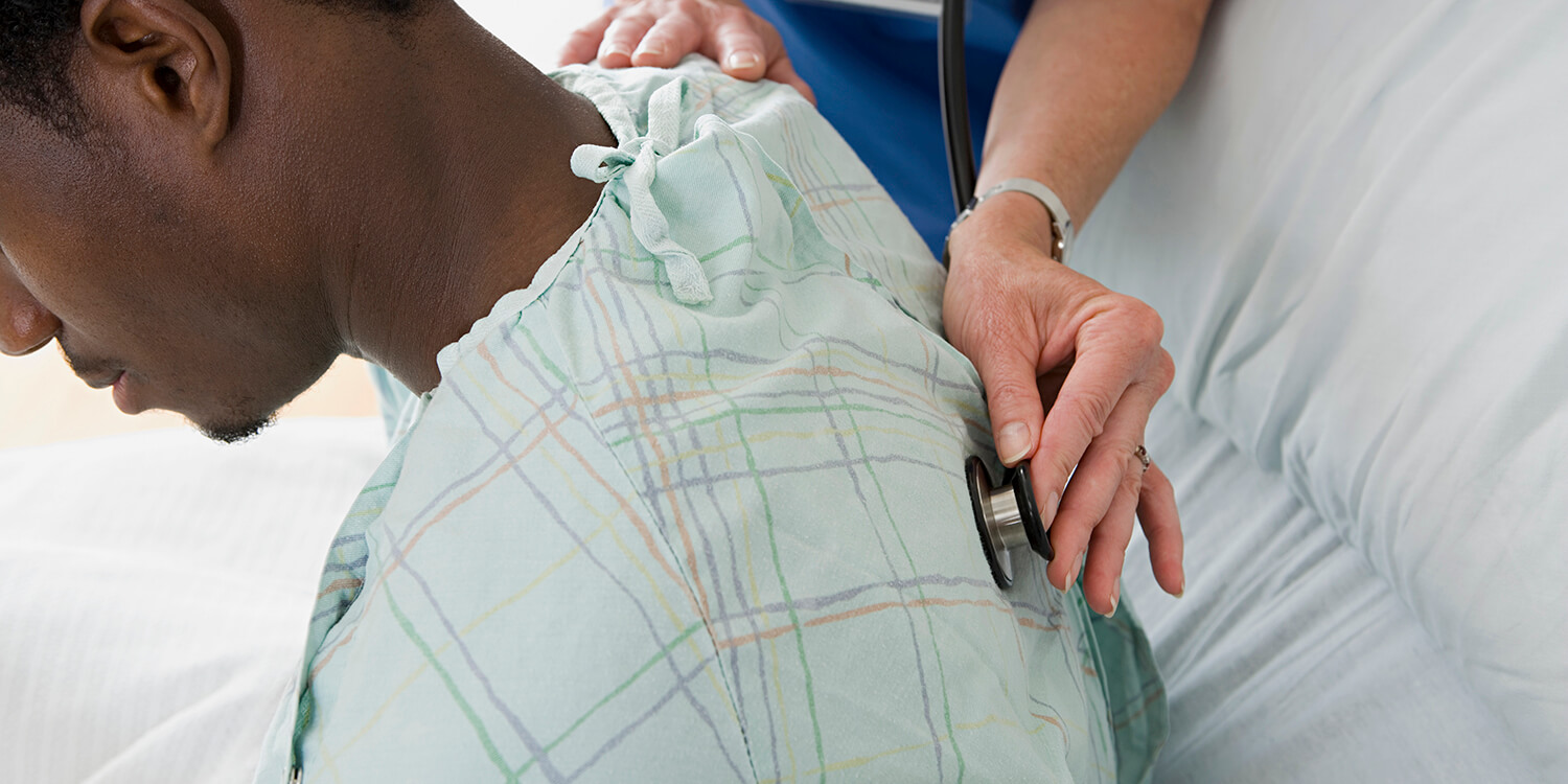 African American Man having examination in hospital